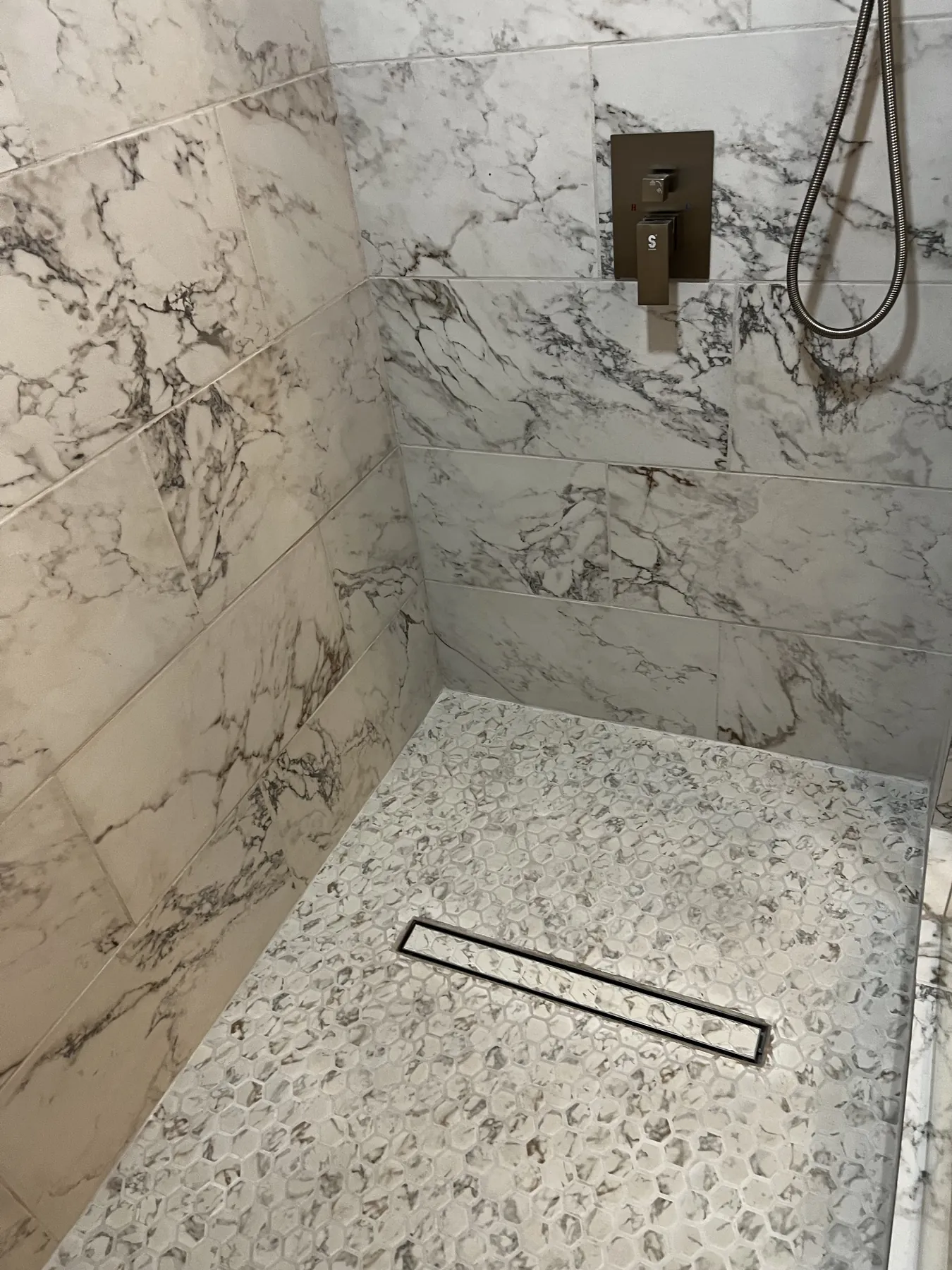 Custom shower tile and linear drain installation detail