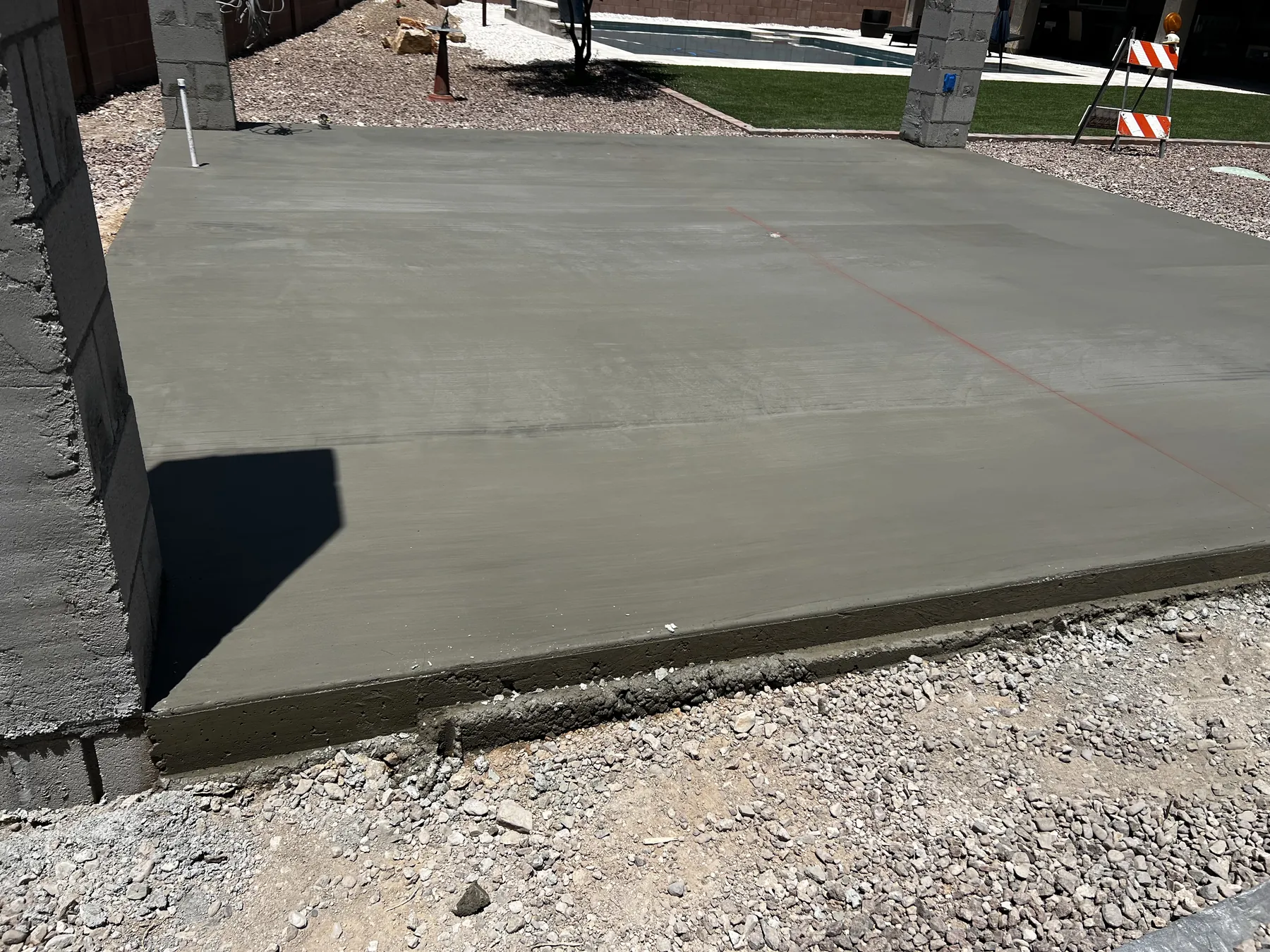 Freshly finished concrete courtyard slab