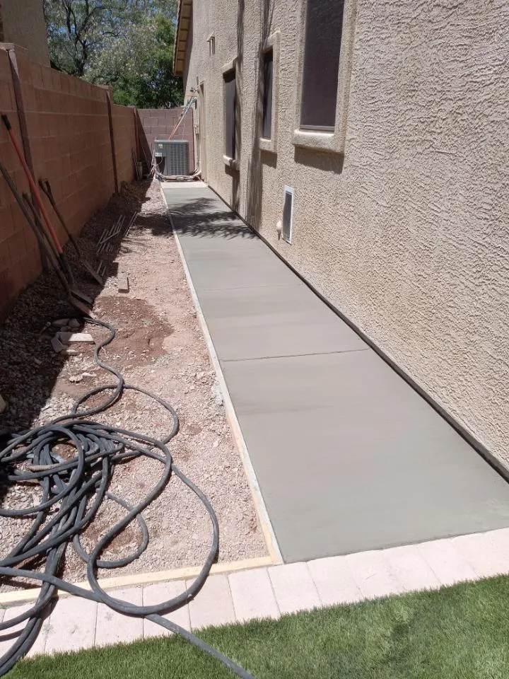 Completed concrete side-yard walkway