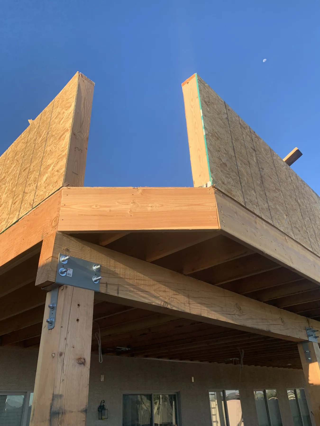 Deck framing and structural connection detail during construction
