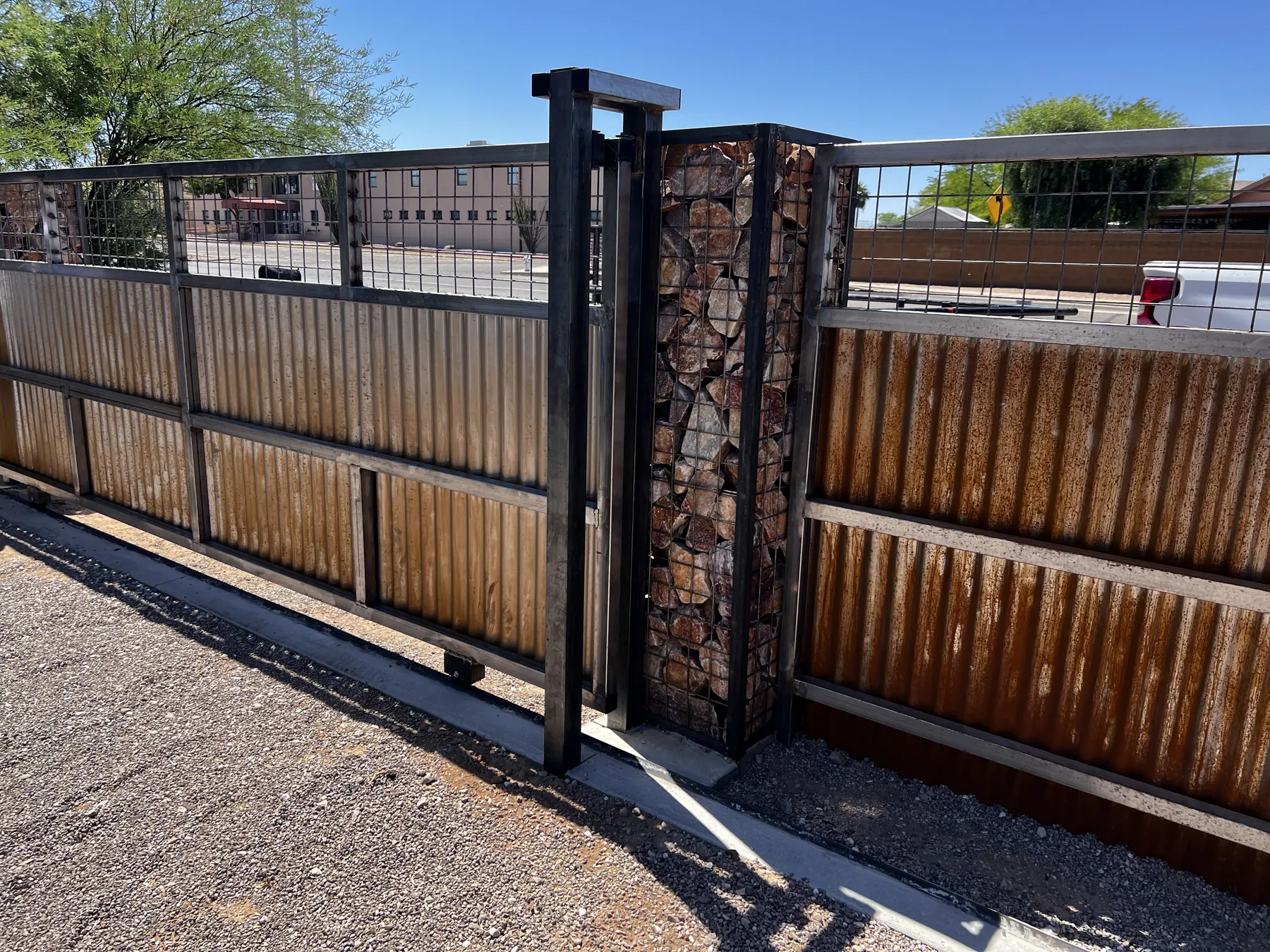 Completed custom metal driveway gate