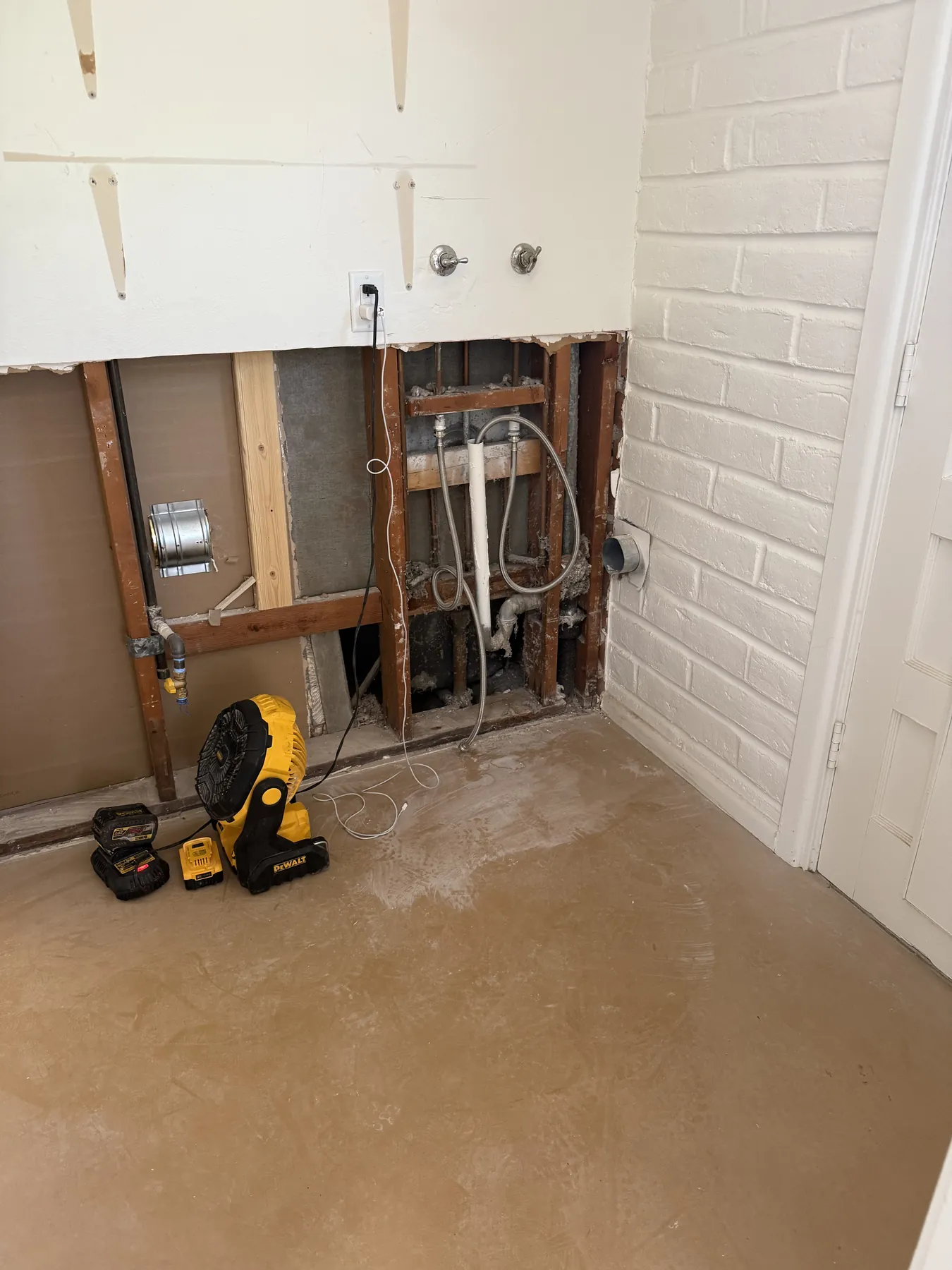 Drying equipment and controlled wall opening during water mitigation