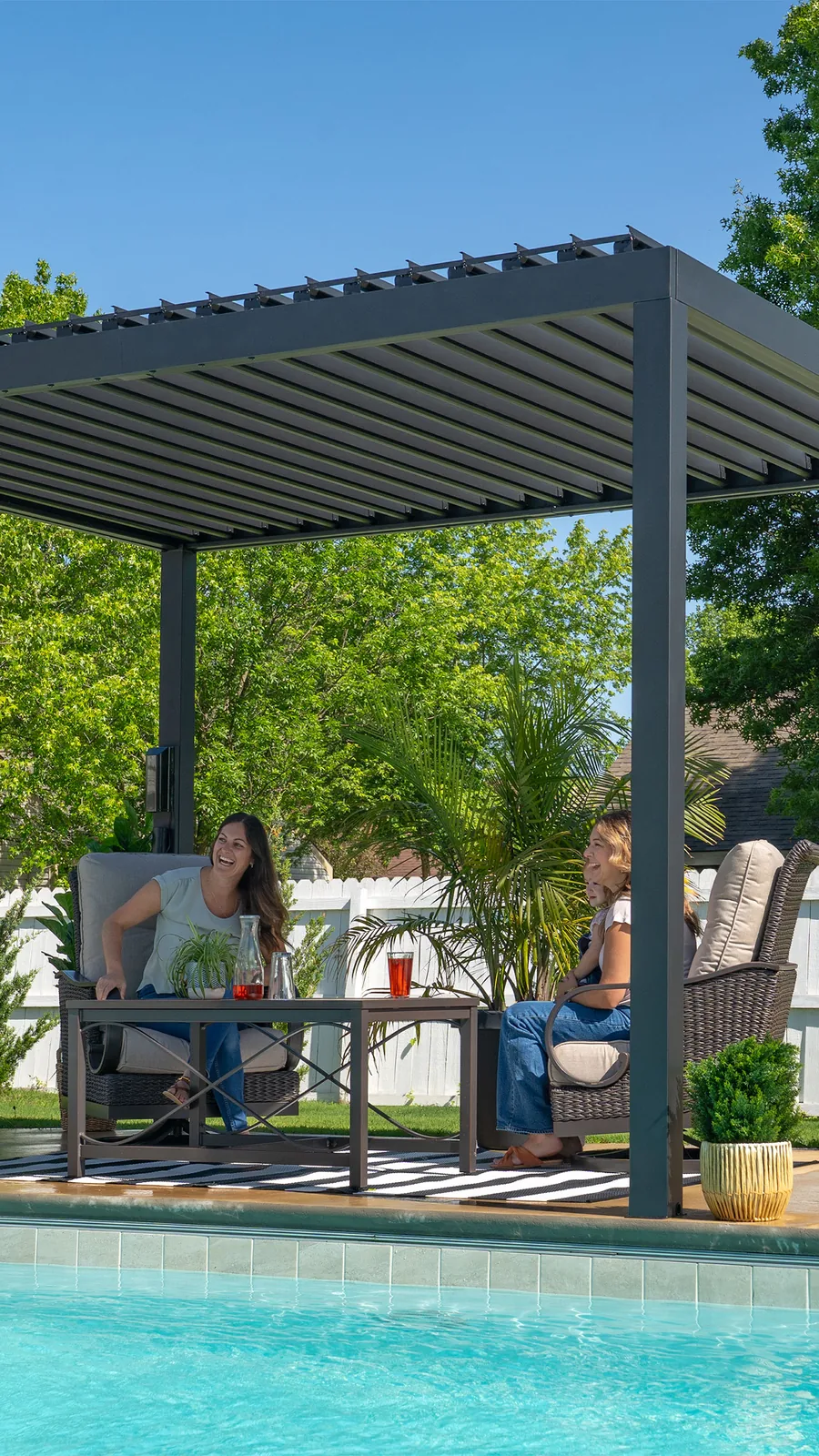 Backyard Discovery Sarasota louvered steel pergola over a dining area